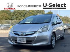 フィットハイブリッド ベースグレード ワンオーナー・障害物センサー・外ナビTV・Bluetooth・ETC 運転席助手席エアバック キーレスエントリーキー 記録簿付 パワーウィンドウ DVD再生 横滑り防止システム AUTOエアコン PS 中古車画像