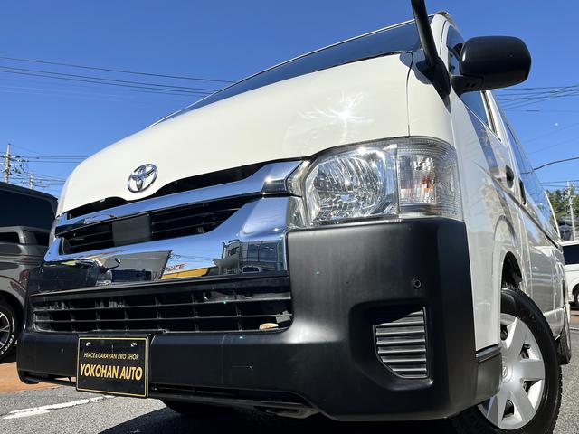 ハイエースバン ＳロングワイドＤＸ　５型　寒冷地仕様　４ＷＤ　純正ナビ　バックカメラ　ＥＴＣ　トヨタセーフティセンス　前席スーパーＧＬシート　電格ミラー　スライド窓　プライバシーガラス（1枚目）