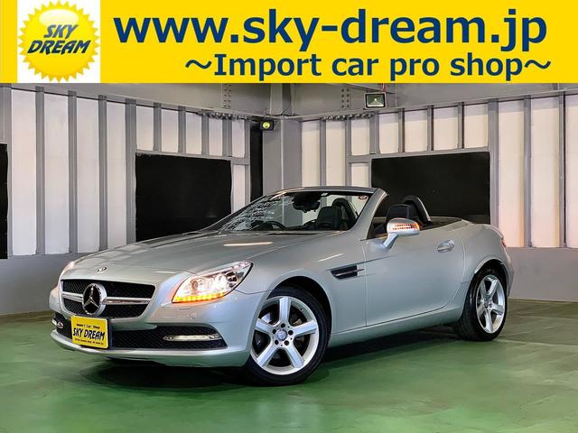 SLK200ブルーエフィシェンシー スポーツ ブラックレザーシート キセノンライト 社外前後コーナーセンサー 純正ナビ地デジ 純正17インチアルミ ETC パドルシフト シートヒーター エアスカーフ 電動オープントップ オートクルーズコントロール(1枚目)