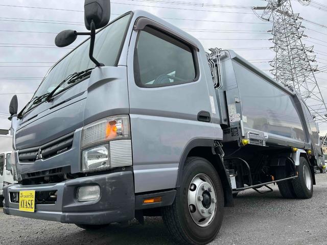 ２．６ｔ積プレス式パッカー車　５ＭＴ　新明和Ｇ－ＰＸ ７．４立米　上物ステンレス加工車　連続スイッチ　汚水タンク付