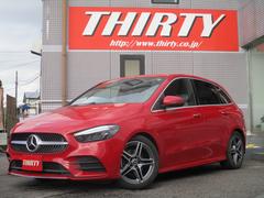 Bクラス B180 AMGレザーエクスクルーシブパッケージ レザーEX アドバンスドPKG レーダーセーフ 純正ナビTV 全方位カメラ 黒革シート アンビエントライト HUD パワーテールゲート シートヒーター ワイヤレスチャージ マルチビームLED 中古車画像