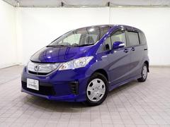 フリードハイブリッド ジャストセレクション ナビテレビ 横滑り防止機能 記録簿 オートクルーズ 地デジ エアバック ウォークスルー DVD再生可能 キーレスエントリー PS ETC 3列 フルオートエアコン ABS 中古車画像