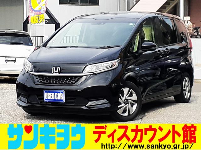 フリードハイブリッド ハイブリッド・Ｇホンダセンシング　禁煙車　後期型　両側電動スライドドア　Ａクルコン　ＥＴＣ　ＬＥＤヘッドライト　プッシュスタート　オートエアコン　社外ナビ　Ｂｌｕｅｔｏｏｔｈ　ＤＶＤ再生　ＳＤ　ＵＳＢ　バックカメラ　除菌　サンシェード（1枚目）
