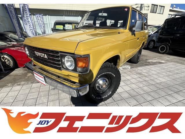 ＶＸ　４ＷＤ☆バン登録☆ナビ☆フルセグＴＶ☆ＤＶＤ☆バックカメラ☆丸目ヘッドライト☆前後メッキバンパー☆メッキドアミラー☆ＦＬＥＸ革調シートカバー☆ナルディウッドハンドル☆グッドリッチホワイトレターＡＴ☆