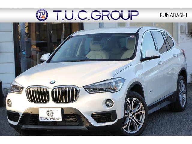 ＢＭＷ Ｘ１ ｓＤｒｉｖｅ　１８ｉ　ファッショニスタ　限定車　真珠色　追従ＡＣＣ　ベージュ革　シートヒーター　衝突軽減ブレーキ　車線逸脱警告　歩行者警告　ＨＤＤナビ　Ｂカメラ　スマートキー　電動トランク　専用１８ＡＷ　Ｐアシスト　ウッドＰ　２年保証