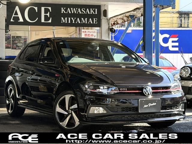 ポロＧＴＩ(フォルクスワーゲン) ベースグレード　テクノロジ−ＰＧ（アクティブインホディスプレイ・スマホワイヤレス充電）セ−フティ−ＰＧ（レーンキ−プアシスト・駐車支援システム）ディスカバ−メディアＰＧ・ＥＴＣ２０．・ＢＳＭ・Ｂｔ付・ＬＥＤ当社下取車 中古車画像