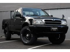 プロシード キャブプラス パートタイム4WD 5速MT 新品デイトナホイール 新品BFGoodrichオールテレーンタイヤ 荷台内チッピングコート リアメッキステップバンパー MOMOステアリング 社外1DINデッキ ETC 中古車画像