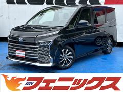 トヨタ　ヴォクシー　ハイブリッドＳ−Ｚ☆トヨタセーフティセンス☆　１０インチナビ☆ＢＴ　ＨＤＭＩ　ＡｐｐｌｅＣａｒＰｌａｙ☆純正後席モニタ☆パノラマモニター☆エレクトロシフトマチック☆ワンタッチＷパワスラ☆☆ＡＣ１００Ｖ☆ヒーター付半革シート☆ルーフスピーカー☆禁煙