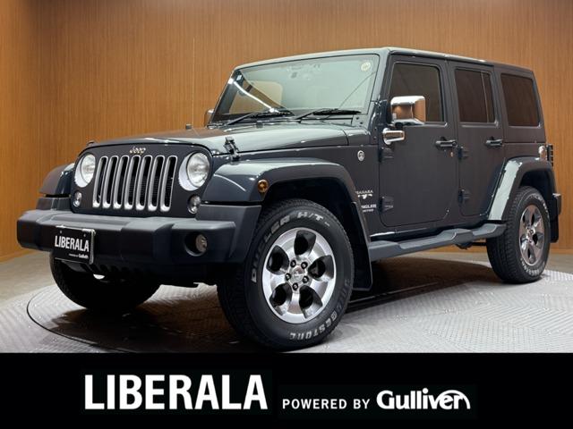 ジープ・ラングラーアンリミテッド(ジープ) サハラ　本革シート　クルーズコントロール　ナビ　ＴＶ　Ｂカメラ　Ｂｌｕｅｔｏｏｔｈ接続　シートヒーター　オートライト　オートエアコン　純正１８インチＡＷ　ワンオーナー　ＥＴＣ　ドラレコ 中古車画像