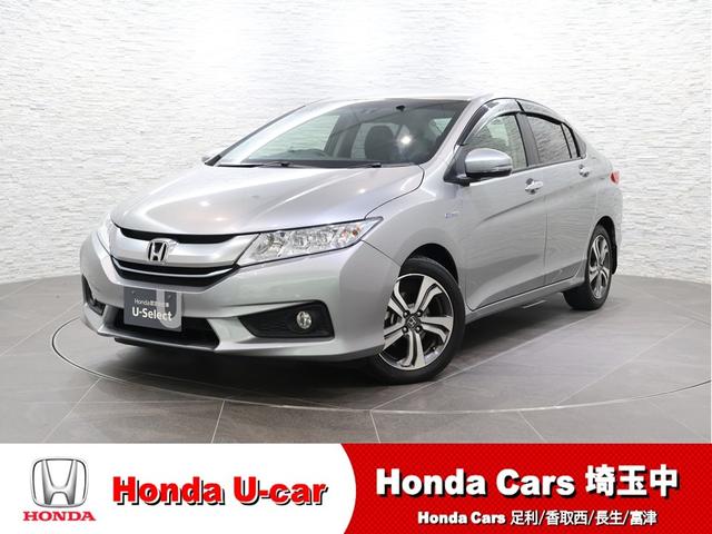 グレイス(ホンダ) ハイブリッドＥＸ　純正ナビ　ワンセグ　クルコン　純正アルミ　スマートキ−　運転席エアバッグ　Ａストップ　エアコン　ＬＥＤヘッドランプ　クルーズＣ　ＤＶＤ再生可能　Ｒカメ　キーレスエントリー　パワーウィンドウ　記録簿付 中古車画像