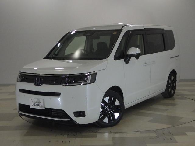 ステップワゴン(ホンダ) ｅ：ＨＥＶエアー　禁煙　７人乗り　マルチビューカメラ　９インチナビ　純正ドラレコ（３カメラ）　ＥＴＣ２．０　前後誤発進抑制　パワーステアリング　両側Ｐスライドドア　助手席エアバッグ　１オ−ナ−　ＵＳＢ接続　クルコン 中古車画像