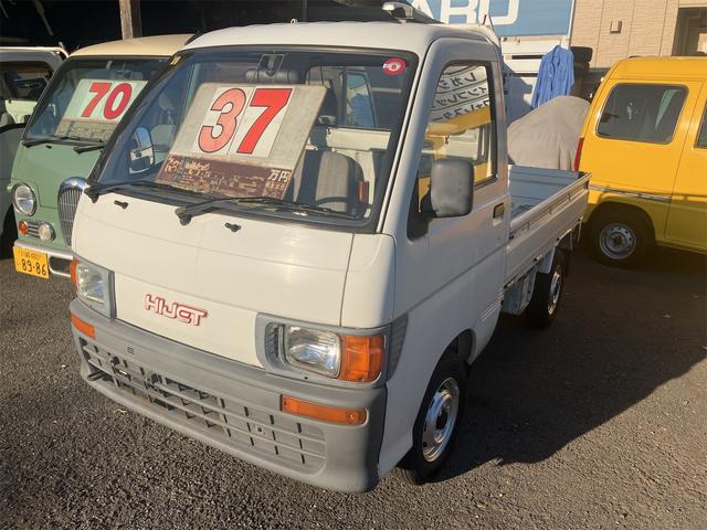 　ホワイト　車検付き　トラック　マニュアル車　ホワイト　１９９５年式　２ドア　車検有　２名乗り　レギュラーガソリン　修復歴無し　サイドブレーキ　エアコン