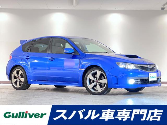 スバル インプレッサ ＷＲＸ　ＳＴｉ　６速ＭＴ車　ＨＫＳマフラー　ＳＴＩキャリパー　ＳＴＩアルミホイール　ＳＴＩハーフレザーシート　ドラレコ　ＥＴＣ　Ｋｅｎｗｏｏｄナビ　ＩＳＯＦＩＸ　ＳＩ－ＤＲＩＶＥ　スマートキー　プッシュスタート