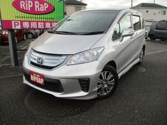 フリードハイブリッド ジャストセレクション 両側電動スライドドア スマーキー ハーフ革シート オートクルーズコントロール ETC HIDライト 2列目キャプテンシート 3列シート6人乗り 中古車画像