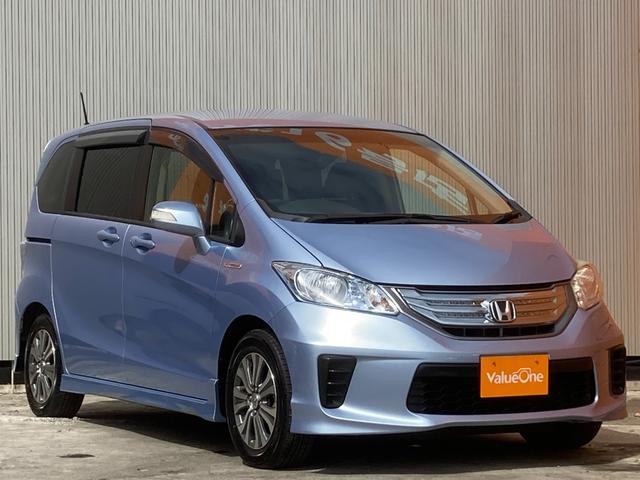 ホンダ フリードハイブリッドジャストセレクション 買取直販 ｈｖバッテリー３年保証 ９インチナビ フルセグｔｖ バックカメラ ｄｖｄ再生 両側自動ドア ハーフレザーシート キセノンライトの中古車 車体価格万円 13 平成25 年式 走行5 8万キロ 車体色プレミアム