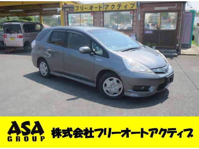 フィットシャトルハイブリッド(ホンダ) ハイブリッド・スマートセレクション　ナビ　ＣＤ　ＤＶＤ　ＴＶ　ラジオ　ＥＴＣ 中古車画像