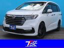 オデッセイハイブリッド ｅ：ＨＥＶアブソルート・ＥＸ　禁煙車／マルチビューカメラ／純正１０インチナビ／純正フリップダウンモニター／ＨＤＭＩ接続／ＢＳＭ／パワーバックドア／クリアランスソナー／ＥＴＣ２．０／アダプティブクルーズ／自動駐車支援システム（1枚目）