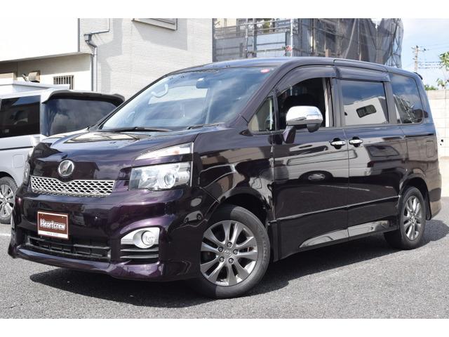 ヴォクシー(トヨタ) ＺＳ　煌　両側パワースライド　後席フリップダウンモニター　メモリーナビ／フルセグＴＶ／Ｂｌｕｅｔｏｏｔｈ／ＥＴＣ／バックカメラ　スマートキー×２／プッシュスタート　ＨＩＤヘッド・フォグ 中古車画像