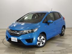 フィットハイブリッド Fパッケージ 禁煙/衝突軽減B/ナビ/Rカメ/Dレコ/ETC/LED/スマキー/6SRS/フルセグ/BTA/CD/DVD/MR/オートライト/間欠ワイパー/ハーフシェイドFガラス/1オナ/記録簿/ISOFIX/ 中古車画像