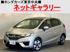 フィットハイブリッド Fパッケージ 禁煙 純正ナビ 弊社下取りワンオーナー車 リアカメラ スマートキー 横滑り防止装置 ETC Bluetooth USB HDMI フルセグ CD/DVD フルオートエアコン 地デジTV 盗難警報装置 中古車画像