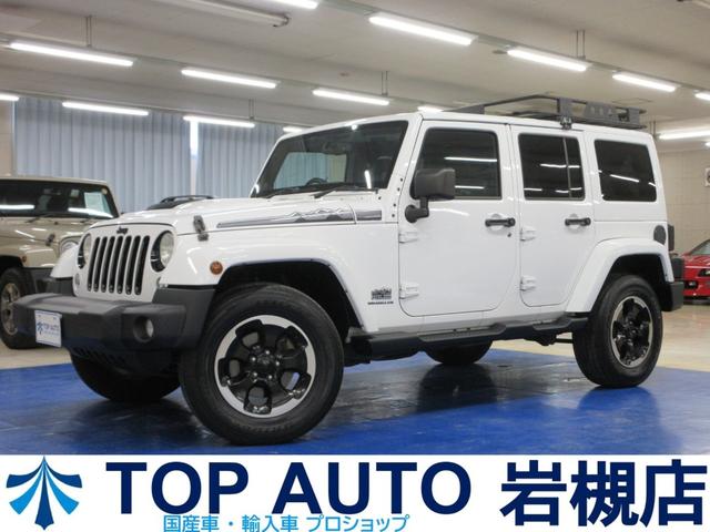 ジープ・ラングラーアンリミテッド ポーラーエディション　４ＷＤ　後期型　限定車　黒革　社外ナビ　フルセグ　Ｂｌｕｅｔｏｏｔｈオーディオ　バックカメラ　ＥＴＣ　クルコン　音楽録音　ディスク再生　シートヒーター　背面タイヤレス　１８インチアルミ　ルーフキャリア　タイミングチェーン（1枚目）