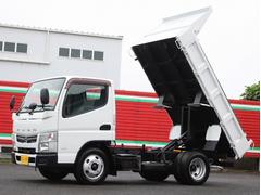 キャンター 全低床ダンプ ダンプ 全低床強化三方開 3トン積 キーレス ディーゼルTB 5速MT3ペダル 極東製荷台DD02-31 コボレーン付きロックあり 歩み掛け付 荷台寸法305-160-38 バイザーマット 中古車画像