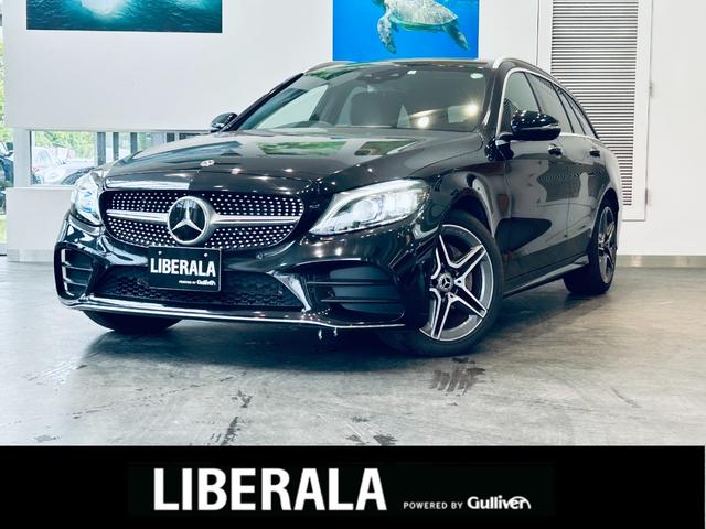 Ｃクラスステーションワゴン(メルセデス・ベンツ) Ｃ２００　ステーションワゴン　ローレウスエディション　１オーナー／レーダーセーフティ／ＨＵＤ／ＡＣＣ／黒革／メモリパワーシート／シートヒーター／純正ナビ／ＴＶ／Ｂカメラ／ｃａｒｐｌａｙ／純１８インチＡＷ／ＬＥＤ／アンビエントライト／電動リアゲート／ＢＳＭ 中古車画像