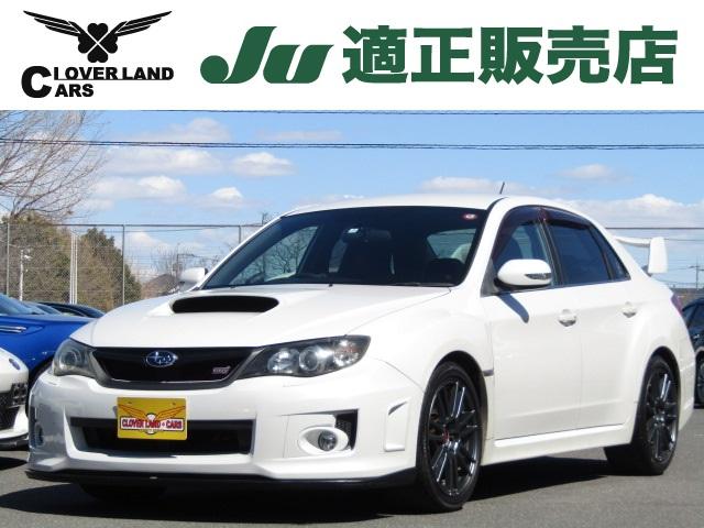 インプレッサ ＷＲＸ　ＳＴｉ　６速ＭＴ　フレキシブルタワーバー　ハーフレザー　ＳＴｉ１８ＡＷ　ＨＩＤライト　パワーシート　ブーストメーター　油温メーター　Ｓｉドライブ　４本出しマフラー　大型リアスポ　スマートキ－（1枚目）