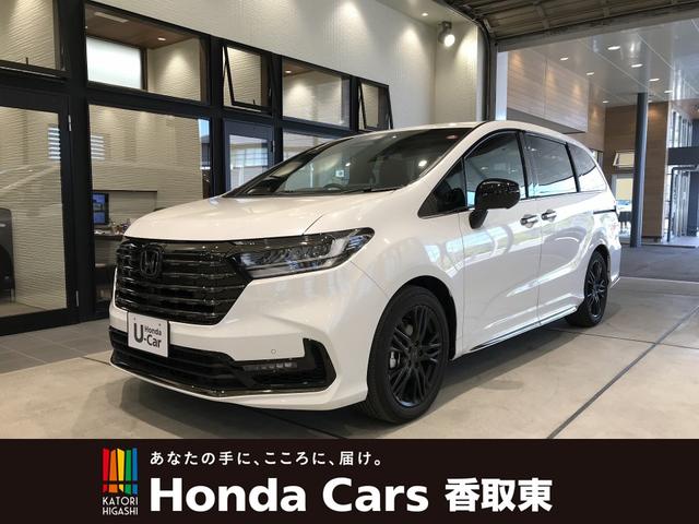 オデッセイ（ホンダ）ｅ：ＨＥＶアブソルート・ＥＸブラックエディション　試乗車　運転支援　１１．４インチ純正ナビ　ＥＴＣ　後席モニター　ＬＥＤヘッドライト　両側電動スライドドア　運転席＆助手席シートヒーター　ワイヤレス充電器　電動シート　パワーテールゲート　純正ＡＷ 中古車画像