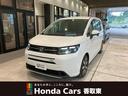 フリード ｅ：ＨＥＶエアー　ＥＸ　フロアマット　９インチ純正ナビ　ＥＴＣ　ドラレコ　運転支援　シートヒーター　ブラインドスポットモニター　本革巻ステアリングホイール　３６０°スーパーＵＶ・ＩＲカット　１５インチＡＷ　レンタカー登録（1枚目）
