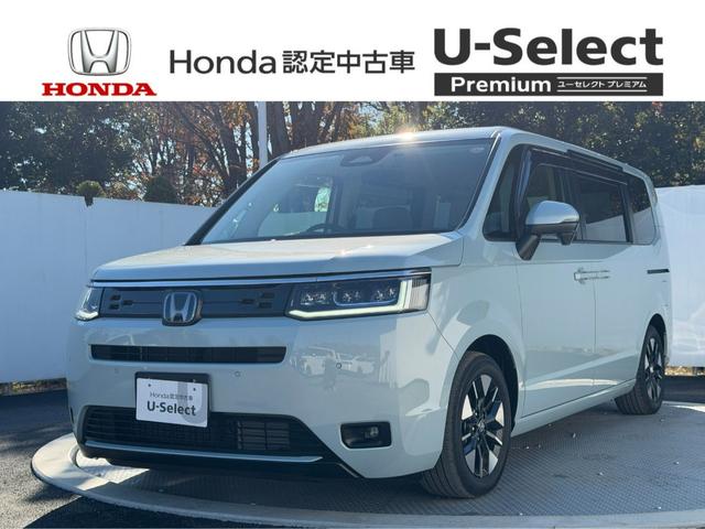ステップワゴン(ホンダ) ｅ：ＨＥＶエアー　ワンオーナー・ＨｏｎｄａＳＥＮＳＩＮＧ・ドラレコ・障害物センサー・９インチ純ナビＴＶ・Ｂｌｕｅｔｏｏｔｈ・ホンダコネクト・Ｒカメラ・ＥＴＣ・両パワスラ・ＬＥＤ・オートハイビーム・ＡＷ　前後誤発進抑制 中古車画像