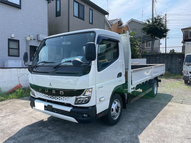 三菱ふそう キャンター ロング　最大積載量４２００ｋｇ　床板鉄板　鳥居鉄板　登録済未使用車　ナビ・ＥＴＣ付き　走行８５キロ　ＡＴ　ＥＴＣ　ナビ　スマートキー　アイドリングストップ　電動格納ミラー