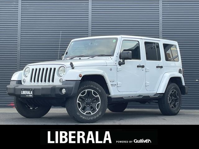 ジープ・ラングラーアンリミテッド(ジープ) サハラ　９インチフローティングナビ　１２セグ　ＢＴ　ＤＶＤ　ＣＤ　サイド／バックカメラ　ＡＬＰＩＮＥスピーカー　ＨＩＤヘッドライト　オートライト　ＥＴＣ　純正１７インチＡＷ　クルーズコントロール　禁煙車 中古車画像