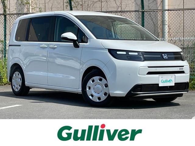 フリード(ホンダ) ｅ：ＨＥＶエアー　登録済未使用車　純正ナビ　バックモニター　衝突軽減ブレーキ　路外逸脱抑制機能　パーキングセンサー 中古車画像