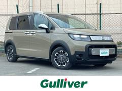 フリード e:HEVクロスター 登録済未使用車 純正9型ナビ ホンダセンシング 両側電動ドア ハーフレザー 追従クルコン フルセグTV Bluetooth 純正15インチAW LEDヘッド コーナーセンサー オートライト 中古車画像