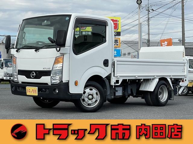 日産 アトラストラック フルスーパーローＤＸ　１．５ｔ　全低床　アームＰＧ　ガソリン車　５速マニュアル　新明和製ＰＧ　電動格納ミラー　坂道発進補助　フォグランプ　ＡＢＳ