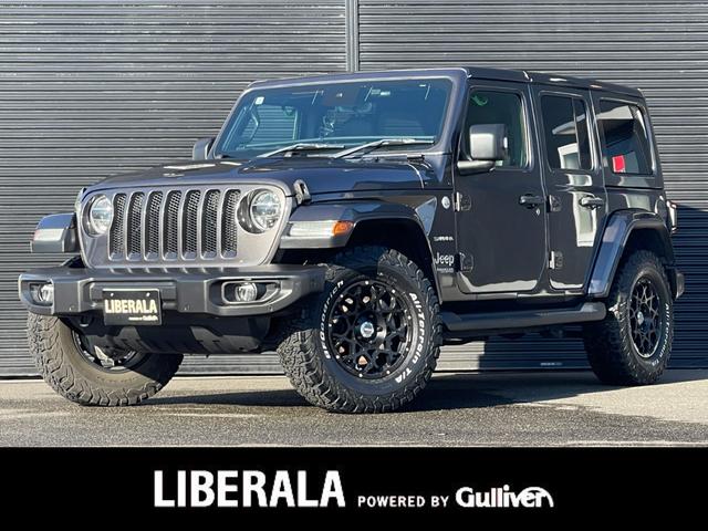 ジープ・ラングラーアンリミテッド(ジープ) サハラ　ユーザー買取　ＢＲＵＴ　２ＳＥＴ　ブロックタイヤ　純正ＡＷあり　純正メモリナビ　Ｂカメラ　カープレイ　ＡＣＣ　ＢＳＡ　ＢＴ　ＬＥＤヘッドライト　黒革　シートヒーター　スペアｋ　保証書 中古車画像