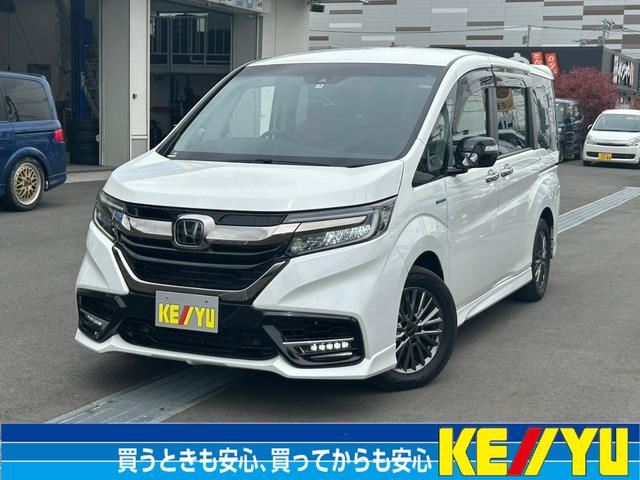 ホンダ ステップワゴン ハイブリッドモデューロＸ　ホンダセンシング　・禁煙・７人乗・わくわくゲート・衝突被害軽減ブレーキ・両側自動スライドドア・レーダークルーズ・ＬＥＤオートライト＆フォグ・Ｂｌｕｅｔｏｏｔｈ対応純正１０型ナビ・地デジＴＶ・バックカメラ・シートヒーター