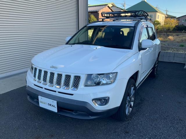 ジープ・コンパス リミテッド 車検整備付 社外メモリーナビ フルセグTV Bluetooth バックカメラ ドラレコ 18インチAW レザーシート シートヒーター ETC(1枚目)