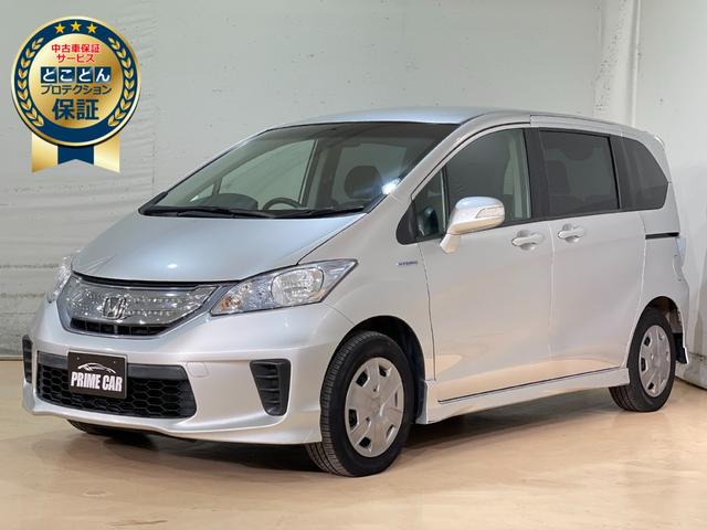 フリードハイブリッド ホンダ ハイブリッド ｅｔｃ ナビ ｔｖ 両側スライド 片側電動 キーレスエントリー アイドリングストップ 電動格納ミラー ３列シート ウォークスルー ｃｖｔ ｃｄ 記録簿 ａｂｓ ｅｓｃ エアコン パワーステアリング 東京都 ハイブリッド