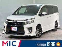 ヴォクシー ZS ETC バックカメラ ナビ TV 衝突被害軽減システム 両側電動スライドドア オートマチックハイビーム オートライト LEDヘッドランプ スマートキー アイドリングストップ 後席モニター Wエアコン 中古車画像