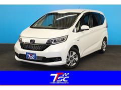フリードハイブリッド ハイブリッド・Gホンダセンシング 禁煙車/後期型/1オーナー/Cパッケージ/ホンダセンシング/両側電動スライドドア/レーダークルーズコントロール/レーンアシスト/クリアランソナー/オートマチックハイビーム/ウォークスルー/寒冷地仕様 中古車画像