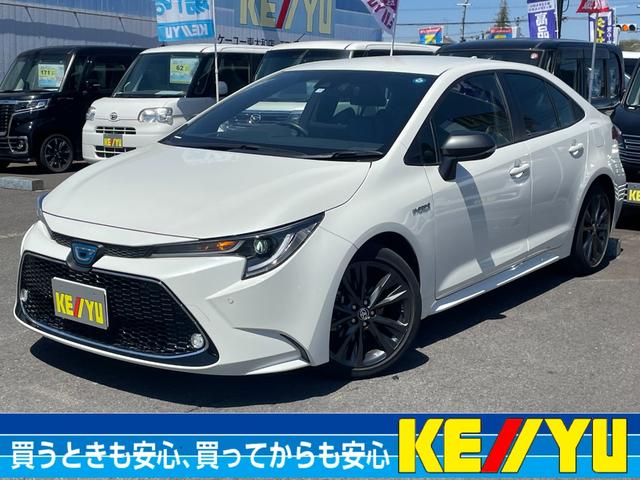 カローラ ハイブリッド　ダブルバイビー／法人ワンオーナー／東大和仕入／　走行３１，００３ＫＭ／メーカーＯＰディスプレイオーディオ／１２セグ／ＢＴ／バックカメラ／ハーフレザーシート／ＬＥＤヘッドライト／オートハイビーム／ビルトインＥＴＣ／ＡＳＶ／純正１７ＡＷ／Ｒスポイラー／（1枚目）