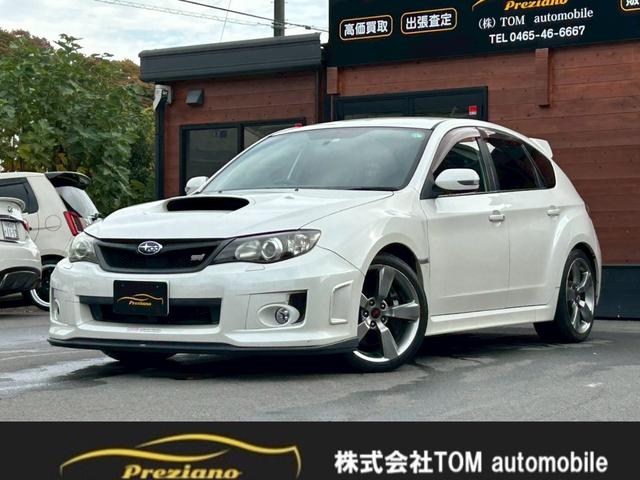 インプレッサ WRX STi 4WD フロア6速MT 前席RECAROセミバケットシート 社外ナビ TV 前後STiスポイラー タワーバー HIDヘッドライト 純正17AW ETC 取説・保証書あり 禁煙車 プッシュスタート(1枚目)