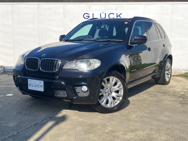 X5(BMW) xDrive 35i Mスポーツパッケージ 禁煙車/パノラマサンルーフ/純正HDDナビ/バックカメラ/黒レザーシート/全席シートヒータ−/純正19AW/パワーバックドア/HIDライト 中古車画像