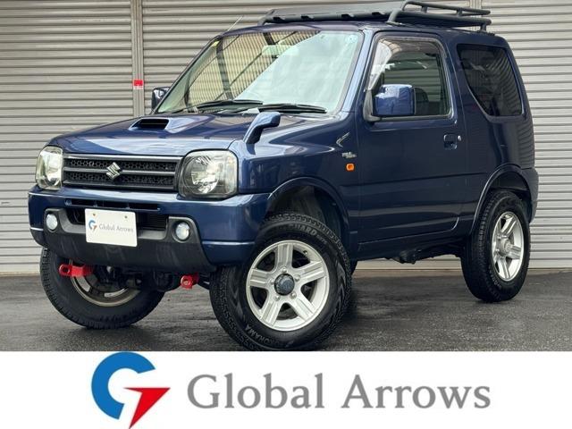 ジムニー(スズキ) ワイルドウインド　特別仕様車　２インチリフトアップ　ＲＡＮＣＨＯステアリングダンパー　ルーフキャリア　社外牽引フック　パナソニックＳＤナビ 中古車画像