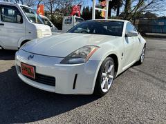 フェアレディZ バージョンT AT HID キーレスエントリー 電動格納ミラー シートヒーター アルミホイール 盗難防止システム 衝突安全ボディ ABS ESC CD DVD再生 カセット エアコン パワーステアリング 中古車画像