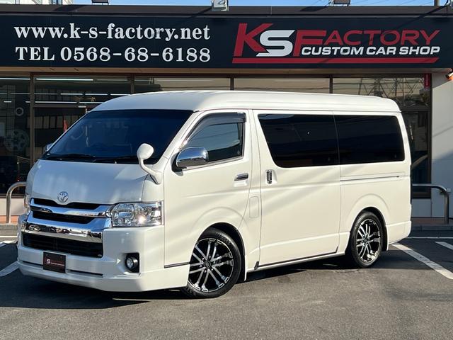 ハイエースワゴン(トヨタ) ＧＬ　ファインテックツアラー４ＷＤ／両側電動スライドドア／４キャプテンシート１０人乗／寒冷地仕様／１１インチナビ／フリップダウンモニター／ＥＴＣ／防音＆防振キット／減衰力調整ショック／１８ＡＷ／ＬＥＤテール 中古車画像