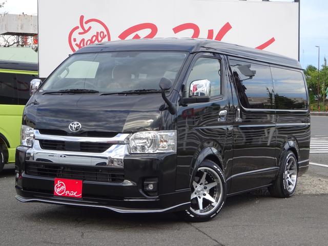 ハイエースワゴン ＧＬ　新車／未登録車／フルセグナビ／後席モニター／ＥＴＣ／ＰＶＭ全方位カメラ／デジタルミラー／ＴＳＳ／パワースライドドア／１７インチＡＷ／パラダ新品ホワイトレタータイヤ／オーバーフェンダー／マフラーカッター（1枚目）
