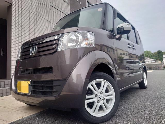 Ｎ－ＢＯＸ ２トーンカラースタイル　Ｇ・Ｌパッケージ　４ＷＤ　両側スライド・片側電動　ナビ　バックカメラ　スマートキー　アイドリングストップ　電動格納ミラー　ベンチシート　ＣＶＴ　盗難防止システム　ＡＢＳ　ＥＳＣ　アルミホイール　衝突安全ボディ　エアコン（1枚目）
